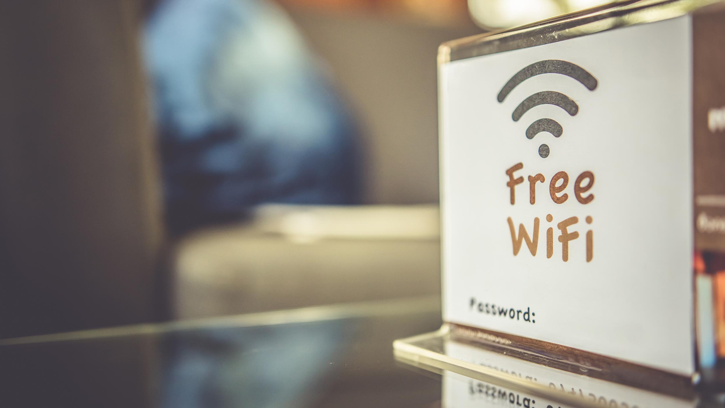 Free,Wifi,Signal,Sign,On,Coffee,Table.
